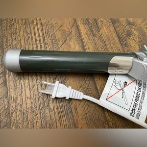 The Beachwaver Pro 1.25 Silver and Dark Green Ceramic Curling Iron